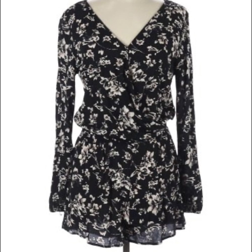 NWOT long sleeved floral romper